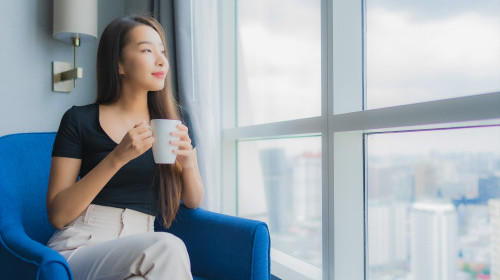 Woman Holding Coffee